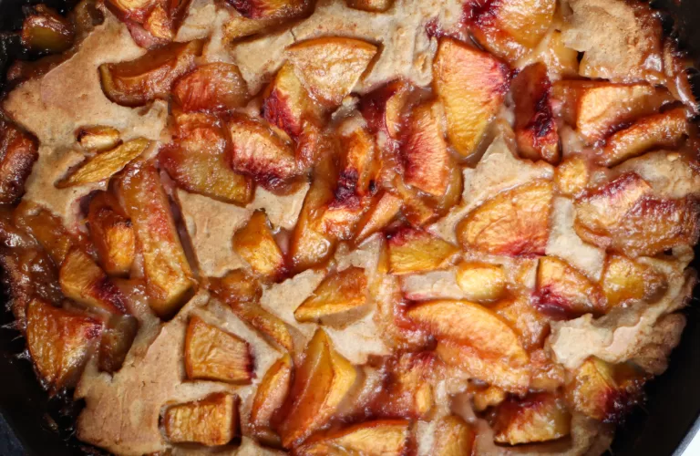 peach cobbler in cast iron