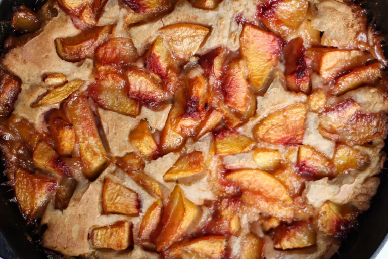 peach cobbler in cast iron