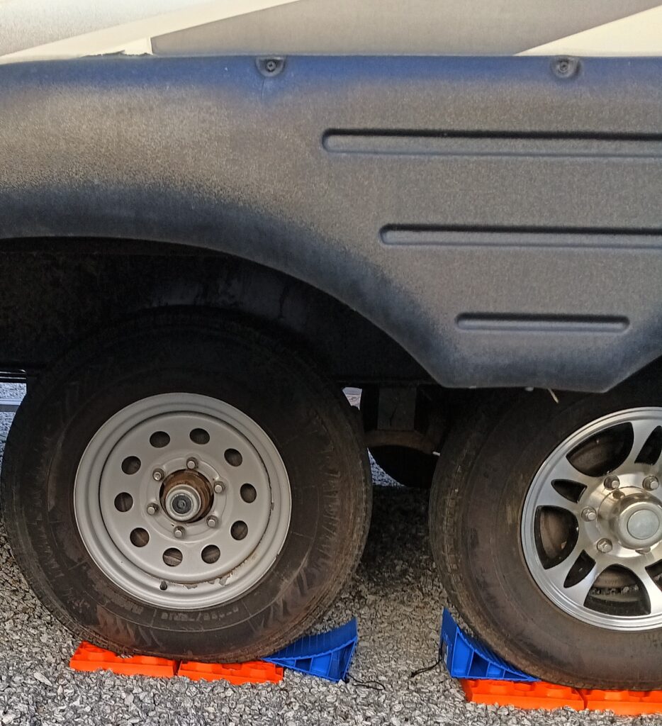 Full Time RV Living Hacks: 100 Truths We Learned Along the Way 8 rv wheel chocks and levelers