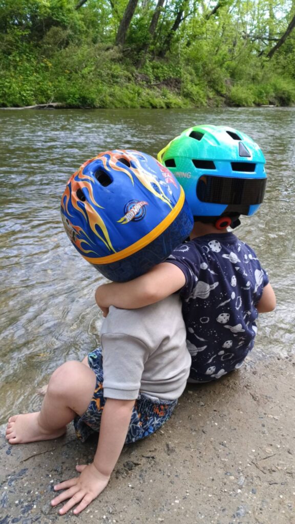 Child learning RV chores while workamping at a campground