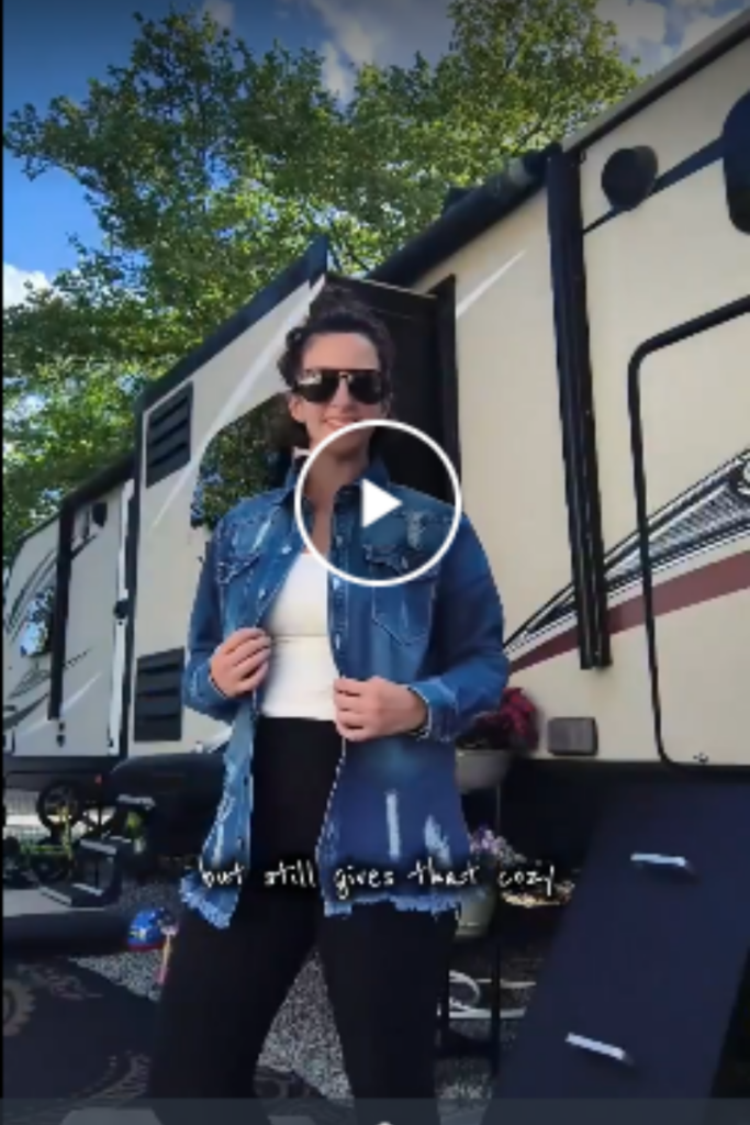 Lifestyle photo of a content creator wearing a denim jacket for a brand shoot, showcasing user-generated content and product styling