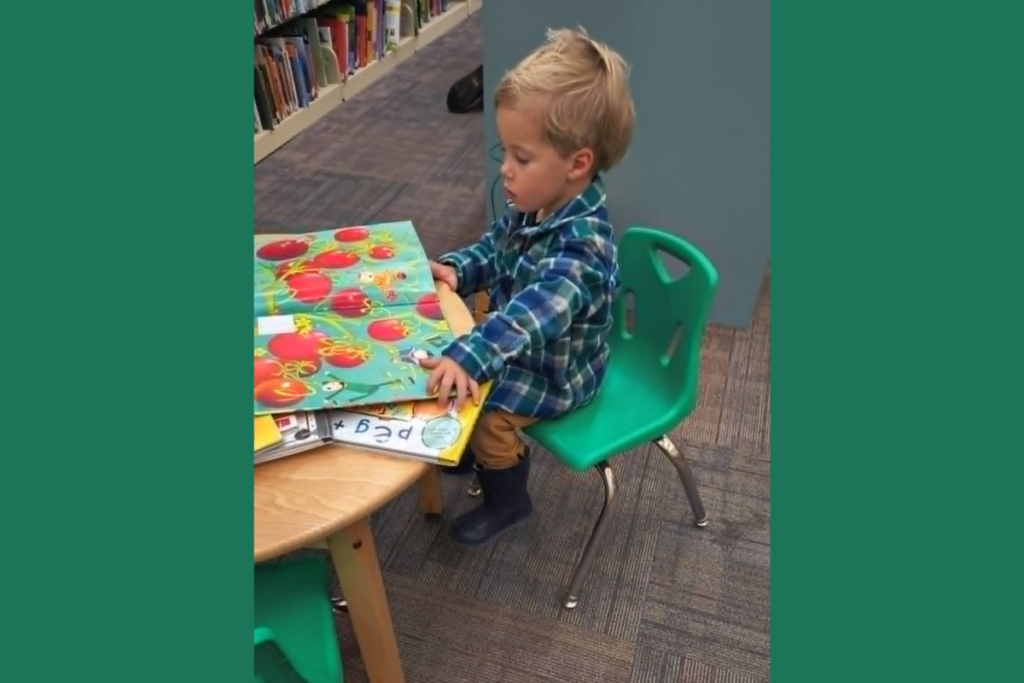 101 RV Homeschool: The Best Guide to Homeschooling While Full-Time RVing 9 Child reading books at a local library during RV homeschooling and roadschooling learning activities focused on homeschool education