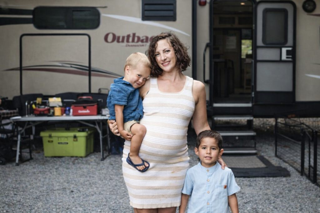mom sharing pros and cons of full time rv life with kids