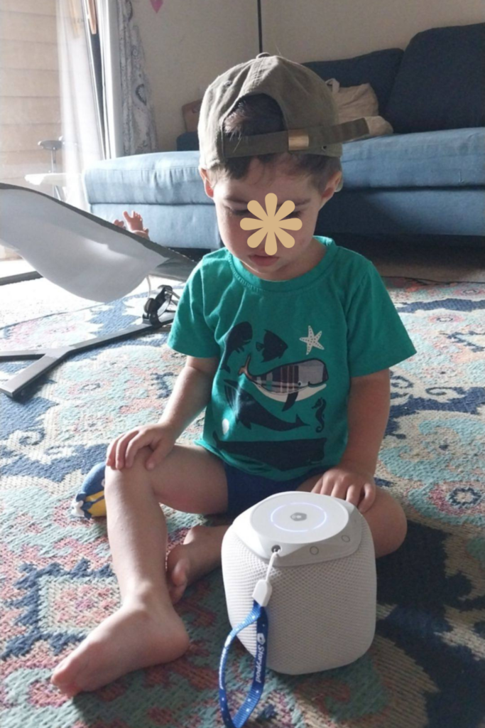 RV Activities for Kids: 50+ Amazing Ideas for Fun Family RV Living 2 Child listening to a Storypod audio player during quiet indoor RV activities for kids