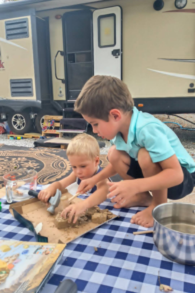 RV Activities for Kids: 50+ Amazing Ideas for Fun Family RV Living 15 Children enjoying gem mining at home as one of many indoor RV activities for kids on rainy camping days