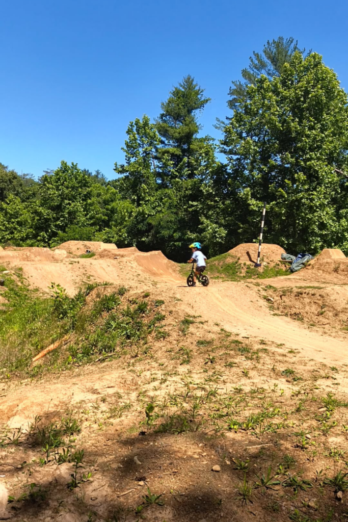 RV Activities for Kids: 50+ Amazing Ideas for Fun Family RV Living 21 Family riding bikes on nearby trails as one of the best camping activities for kids during an RV trip