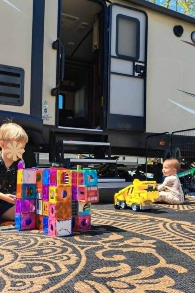 RV Activities for Kids: 50+ Amazing Ideas for Fun Family RV Living 12 RV activities for kids with Magna-Tiles building challenge on a picnic table outside the RV during a family camping trip